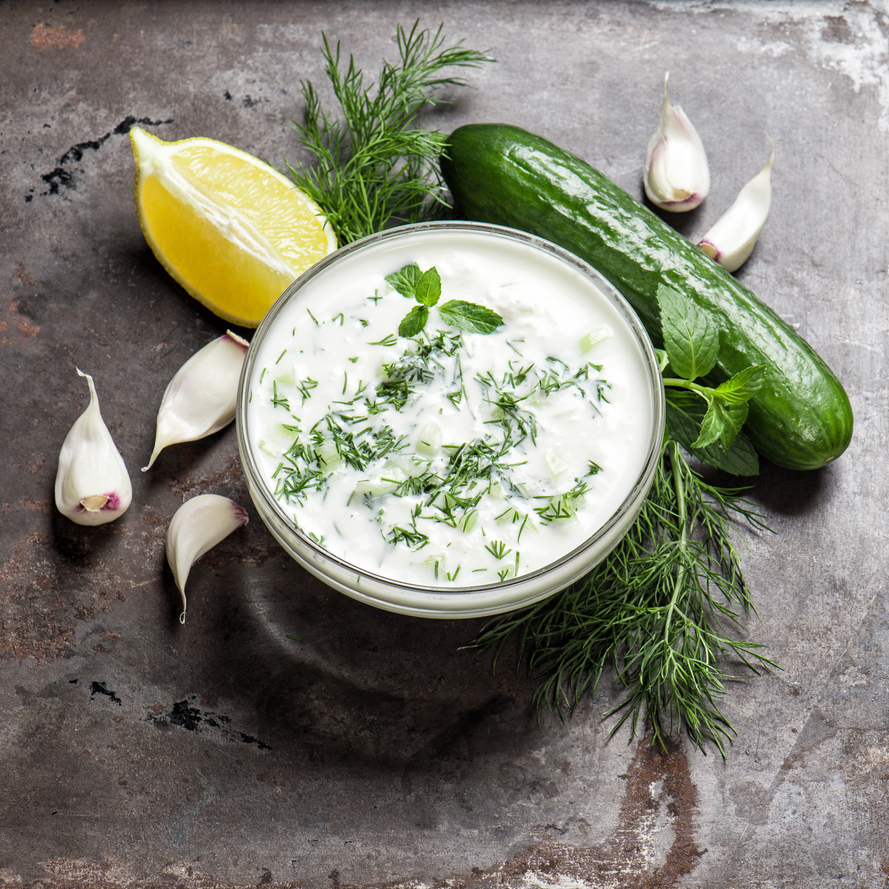 Fresh tzatziki yogurt sauce. Herbs and vegetables